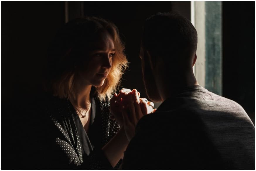 Golden light shining through a womans hair