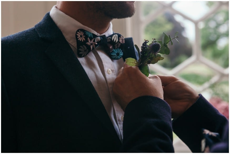 Groom in personalied unique floral navy bow tie