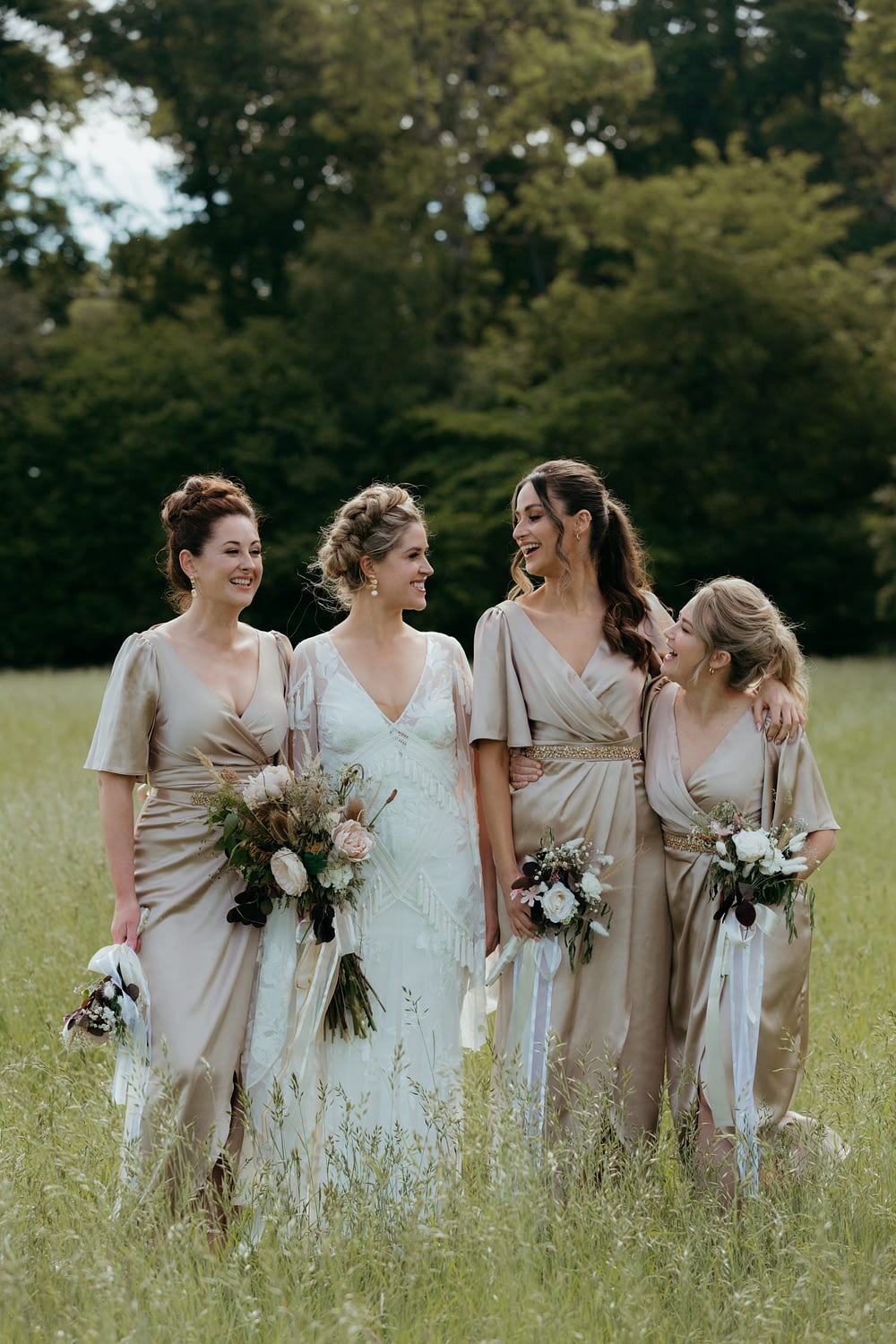 Bride with bridesmaids at Martinstown House Wedding 